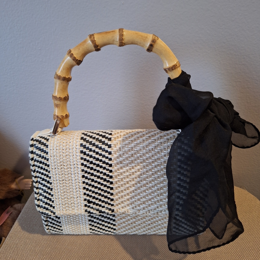 Chic Black and White Woven Handbag with Bamboo Handle